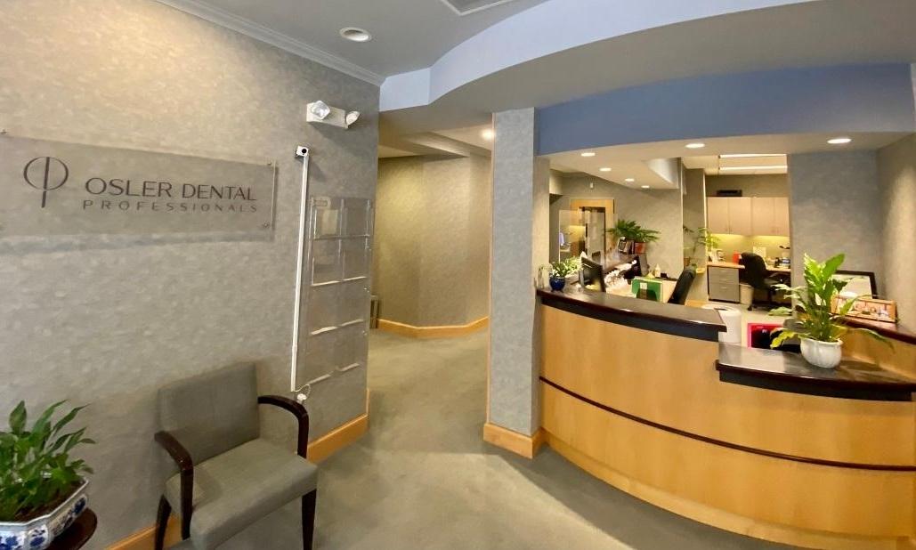Reception area and front desk at Osler Dental Professionals in Towson, MD