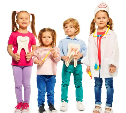 Four children holding giant tooth models and a toothbrush, one dressed as a doctor